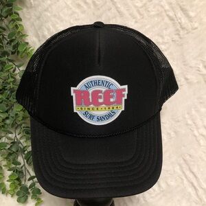 New Reef trucker hat in black, brightly colored logo, adjustable snap closure
